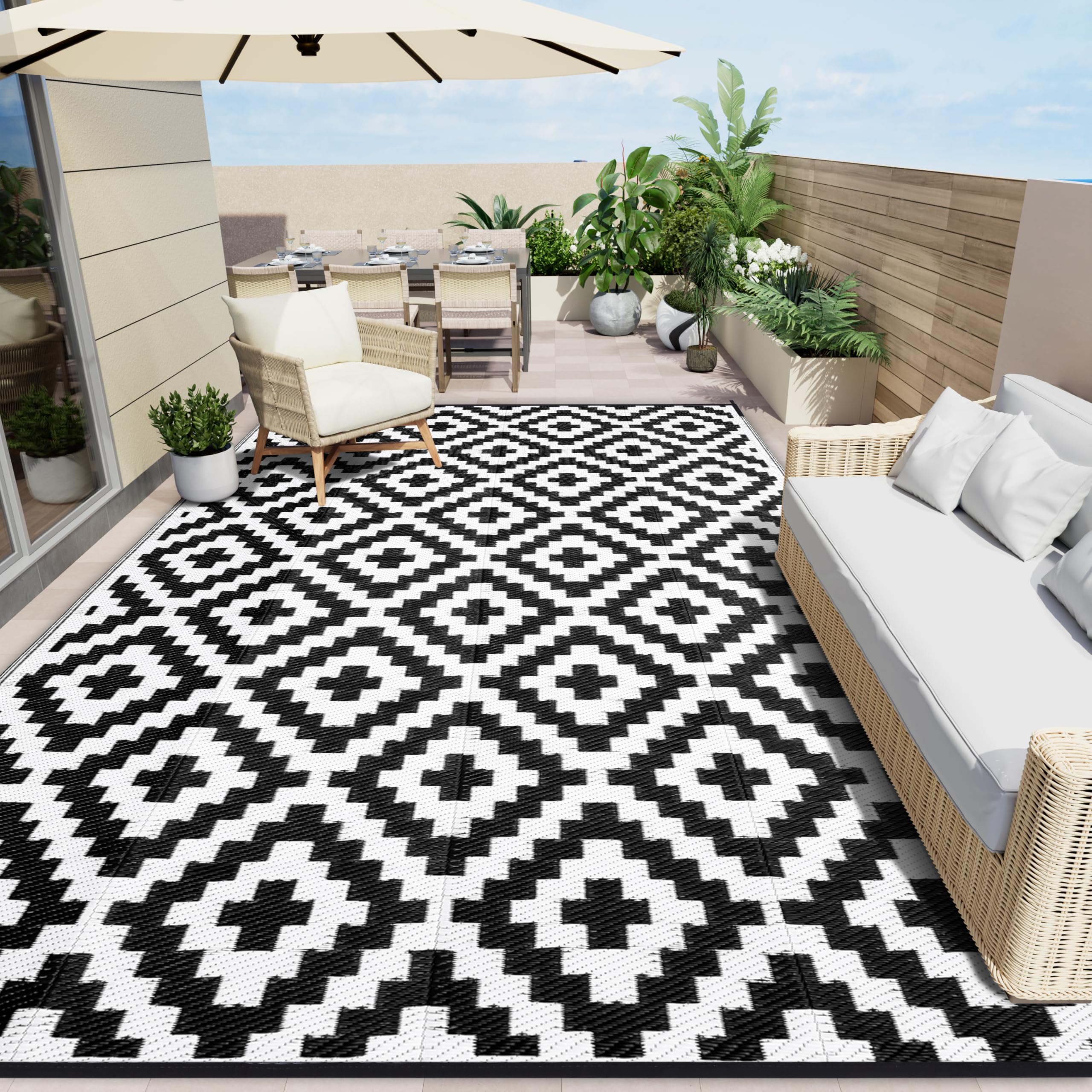 OLANLY Waterproof Outdoor Rug 5x8 ft, Outdoor Plastic Straw Rug for Camping, RV Mat Outside, Indoor Outdoor Carpet for Porch, Deck, Backyard, Balcony, Picnic, Black & White